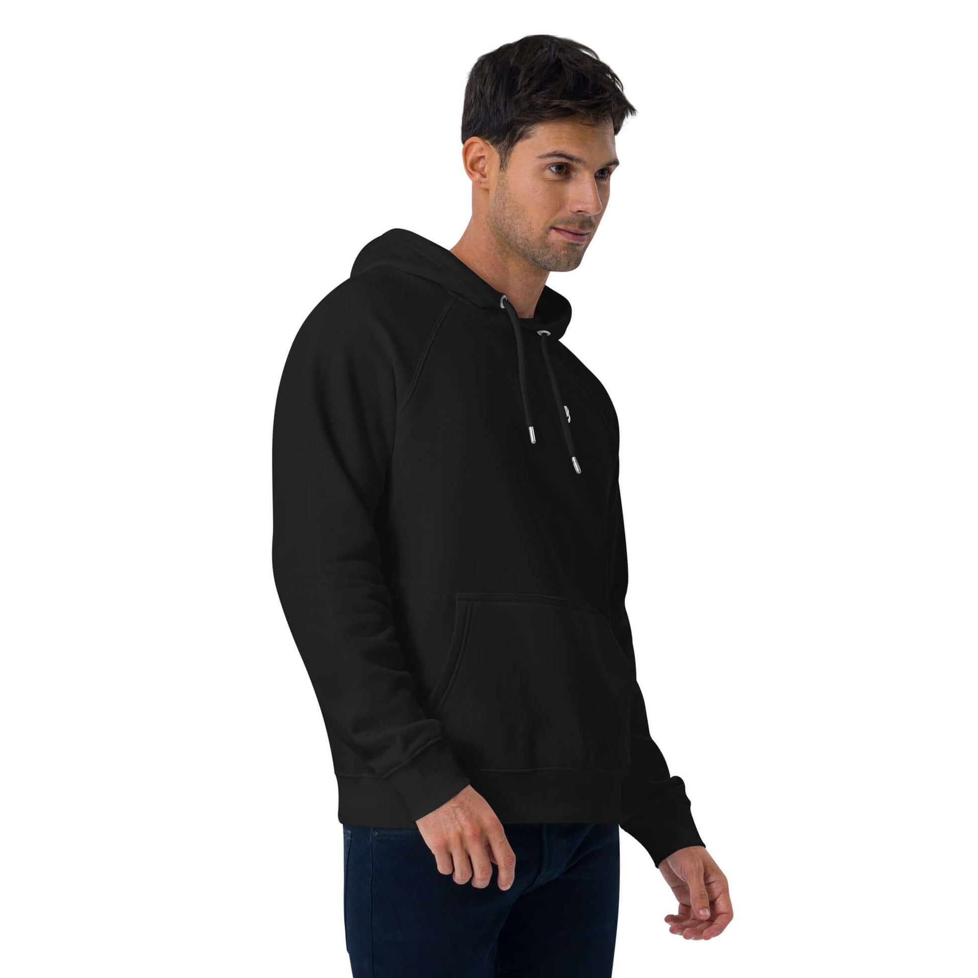 Model wearing Unisex Bio-Raglan-Hoodie N°4 in black, showcasing soft fabric and versatile style.