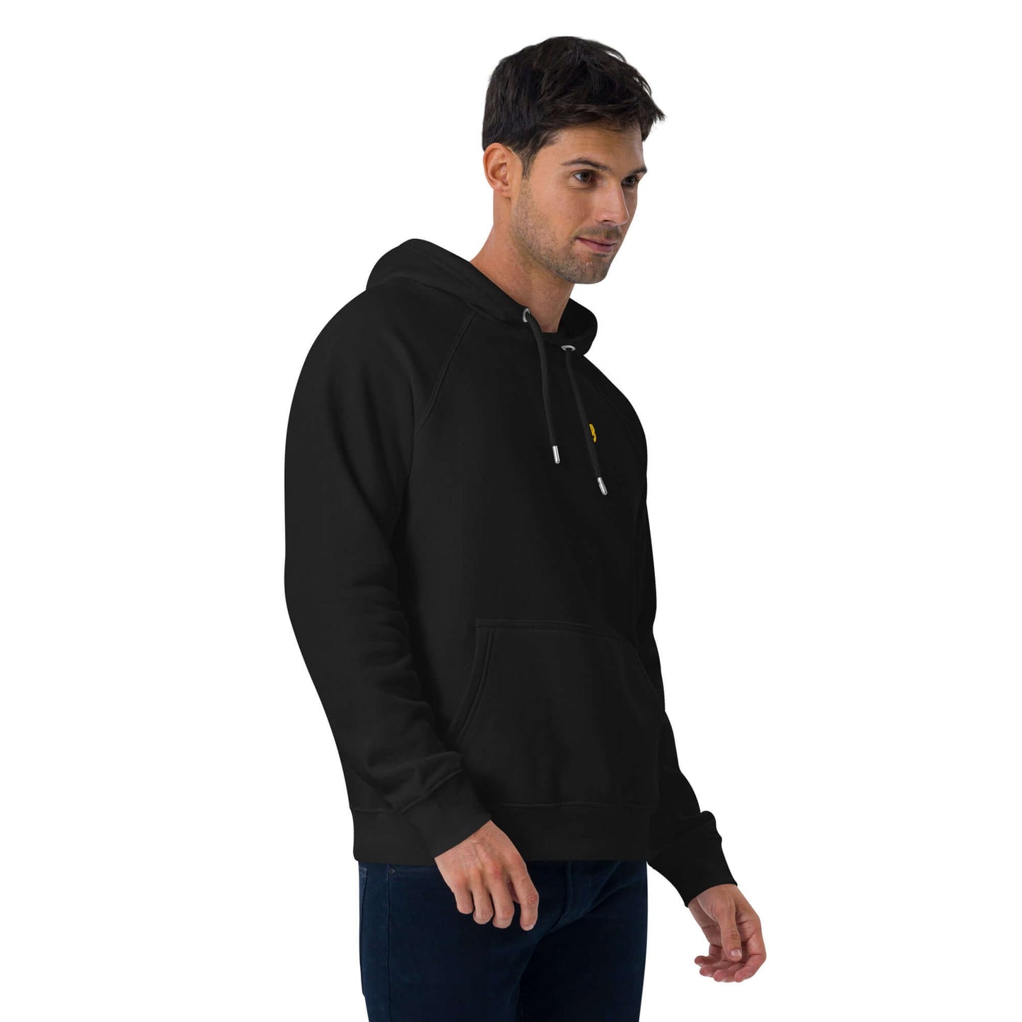 Man wearing Unisex Bio-Raglan-Hoodie N°5 in black, showcasing comfortable and stylish casual wear.