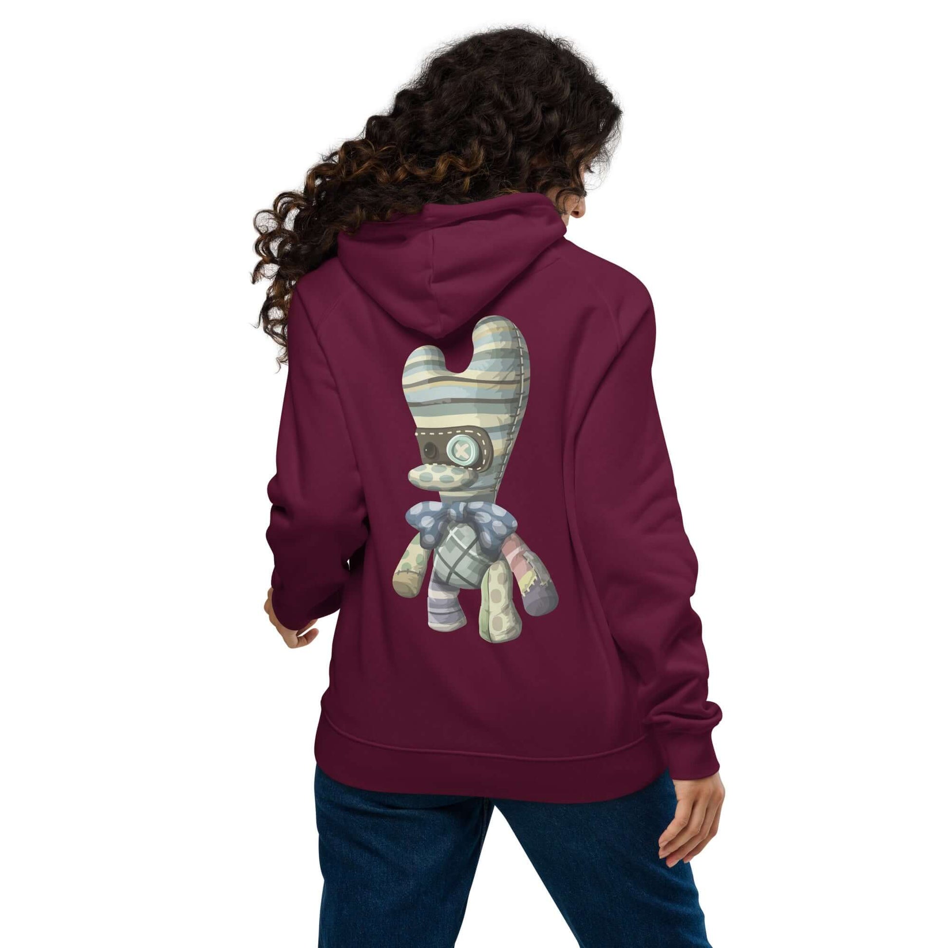 Person wearing Unisex Bio-Raglan-Hoodie N°4 in maroon, featuring a unique back design, viewed from the back.
