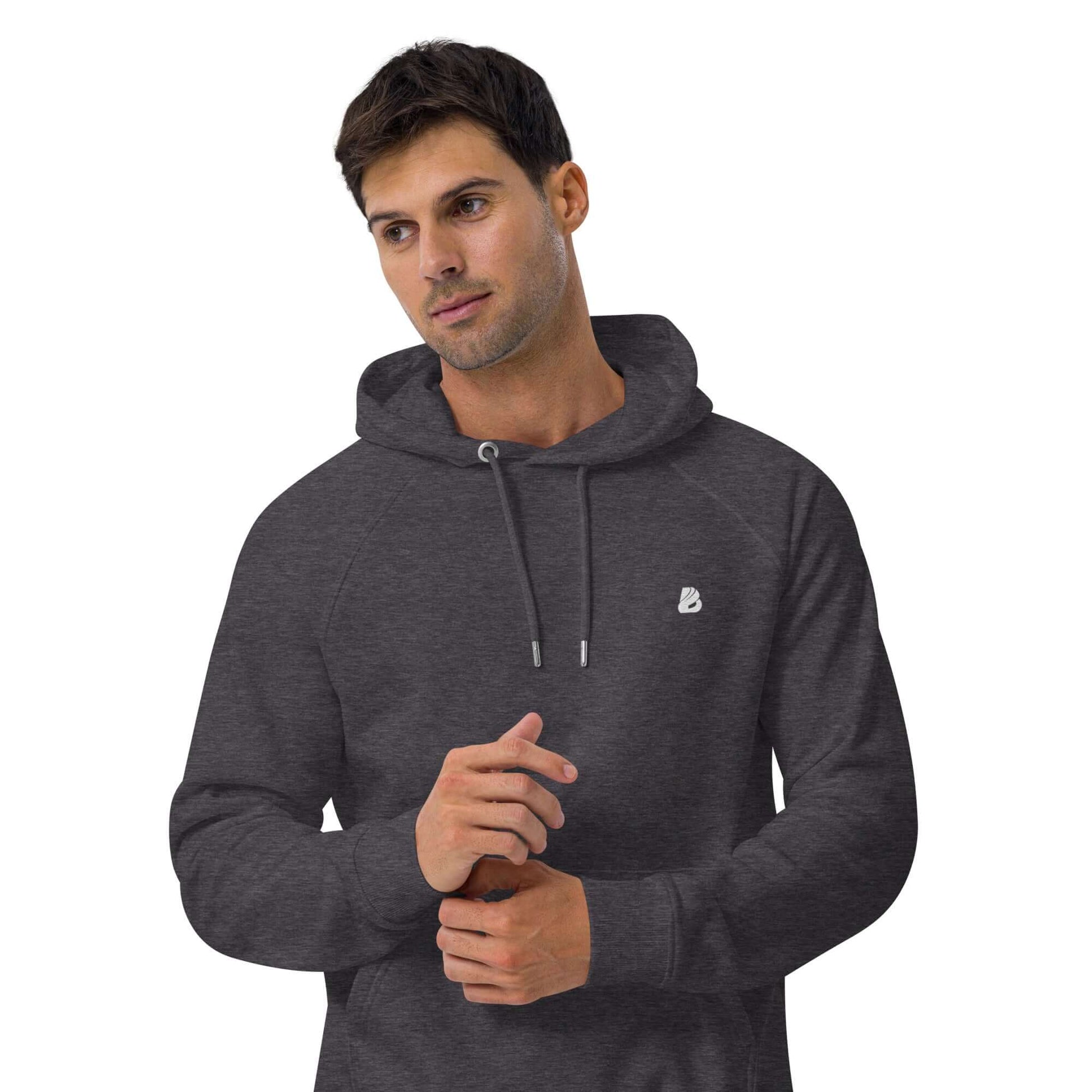 Man wearing Unisex Bio-Raglan-Hoodie N°4 in dark grey, showcasing casual comfort and style.
