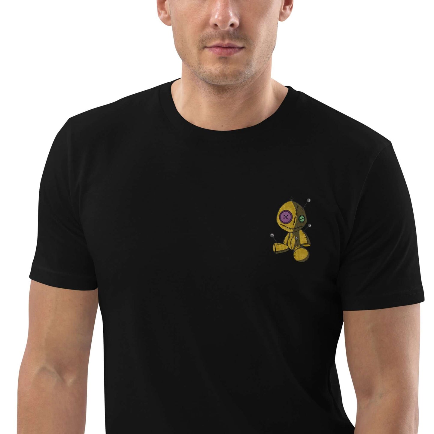 Model wearing Unisex-Bio-Baumwoll-T-Shirt N°1, black, 100% organic cotton with yellow and purple graphic, eco-friendly fashion