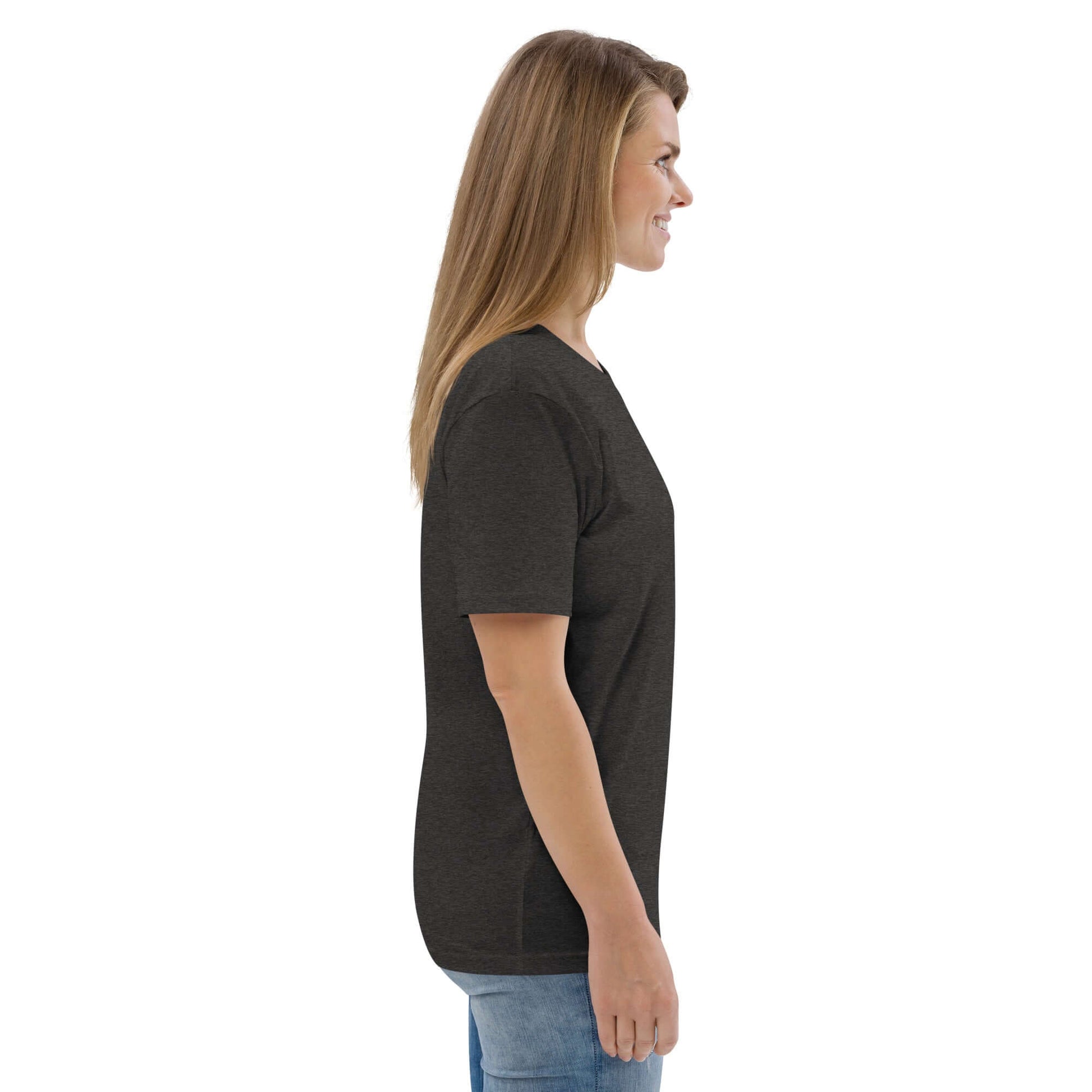 Side view of model wearing Unisex-Bio-Baumwoll-T-Shirt N°1, made from 100% organic ring-spun cotton, showcasing eco-friendly fashion.