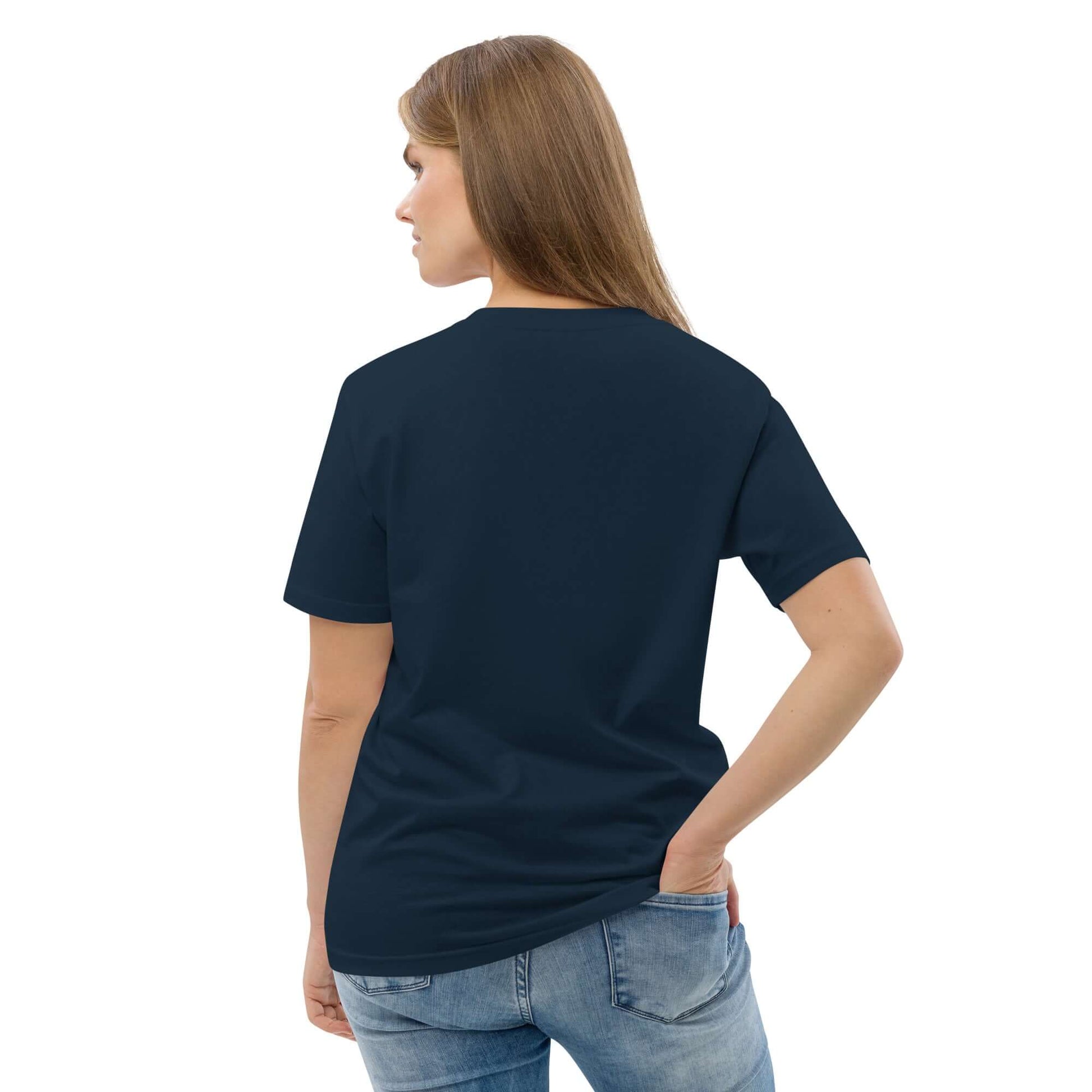 Back view of model wearing Unisex-Bio-Baumwoll-T-Shirt N°1, 100% organic cotton, in navy color, highlighting sustainable fashion choice.