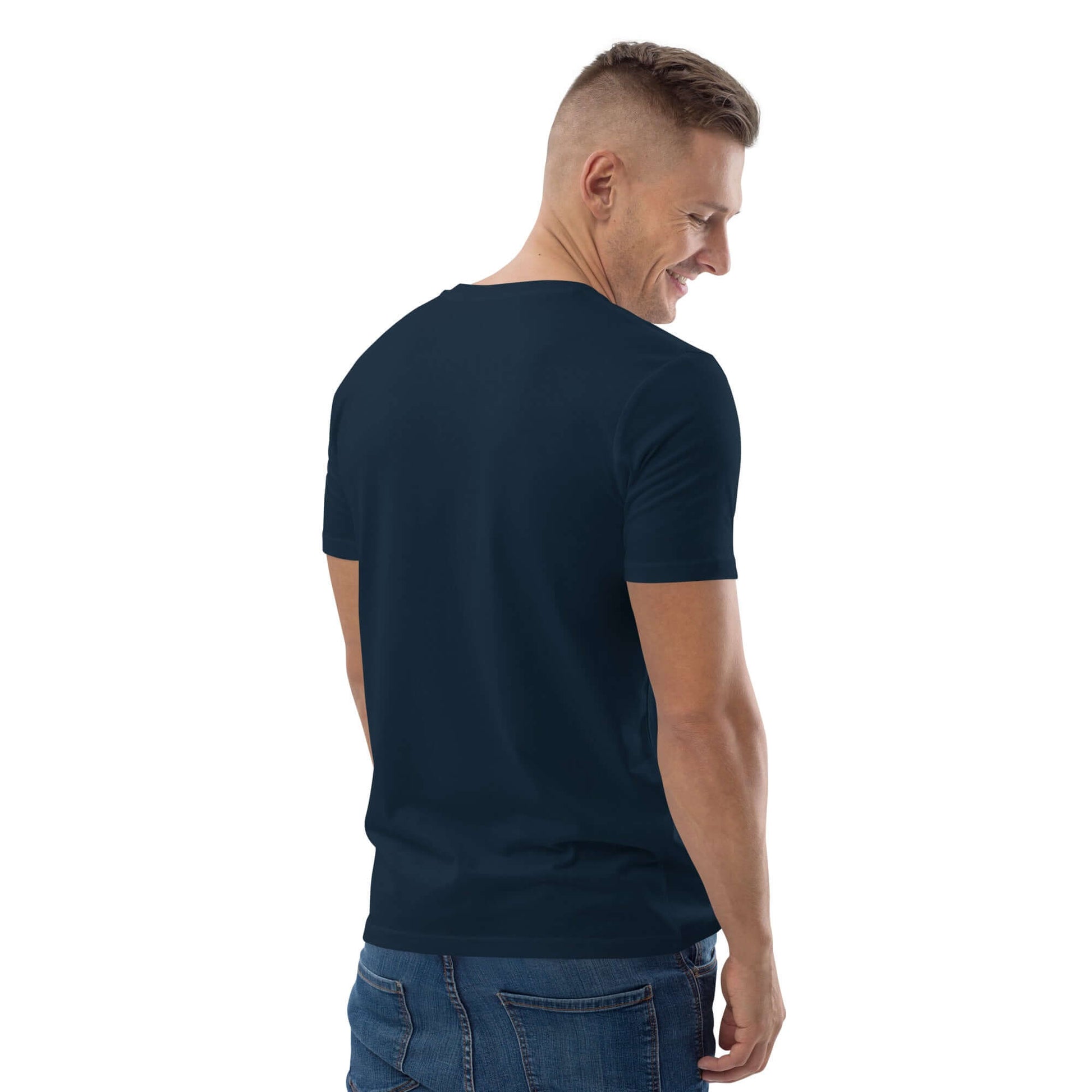 Rear view of model wearing Unisex-Bio-Baumwoll-T-Shirt N°1 in navy, made from 100% organic cotton, showcasing eco-friendly fashion.