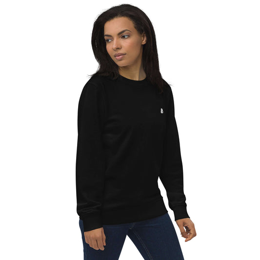 Model wearing Unisex Bio-Pullover N°0 made from organic and recycled materials, showcasing eco-friendly fashion style.