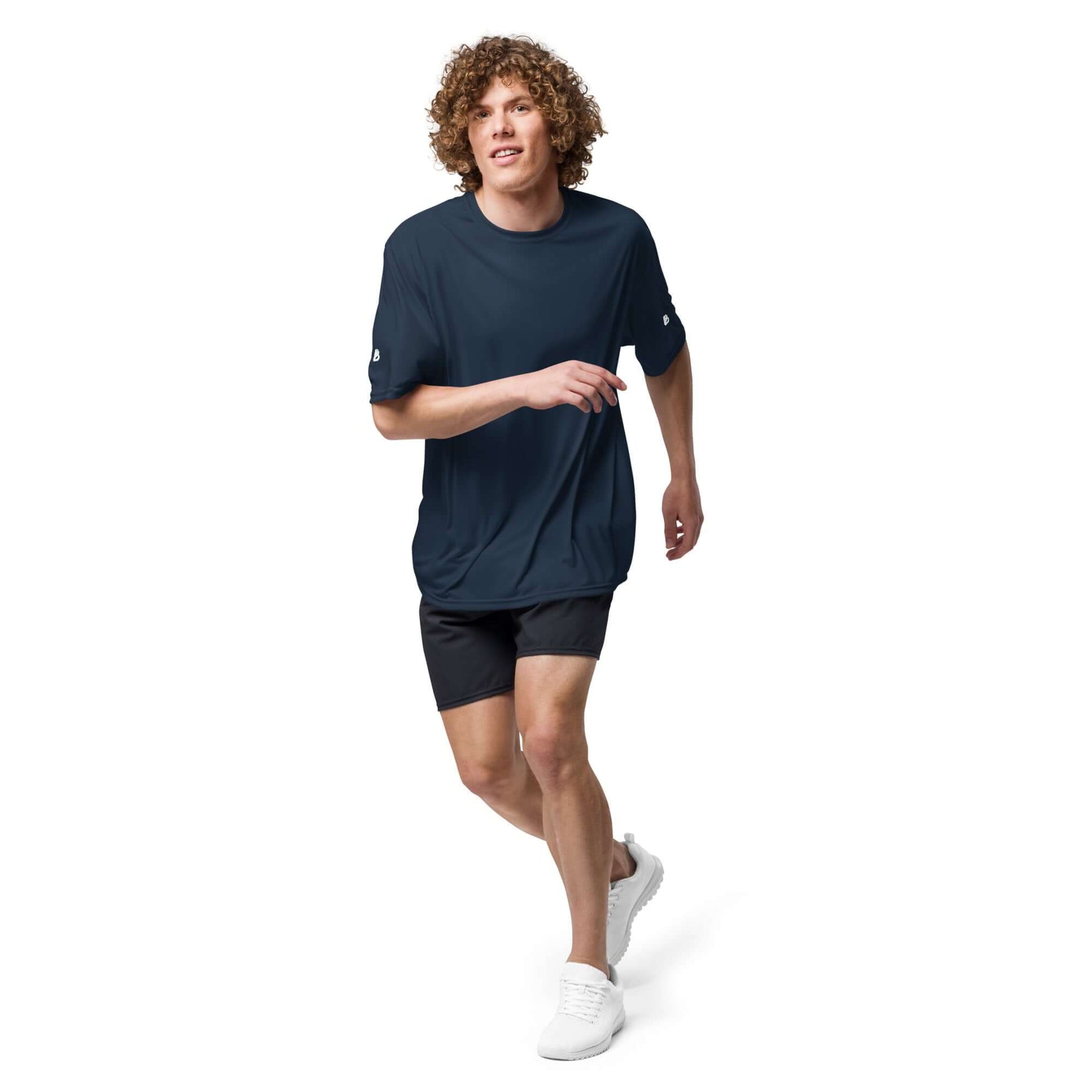 Person running in Unisex Performance T-Shirt mit Rundhalsausschnitt N°0, showcasing athletic wear for sports activities.