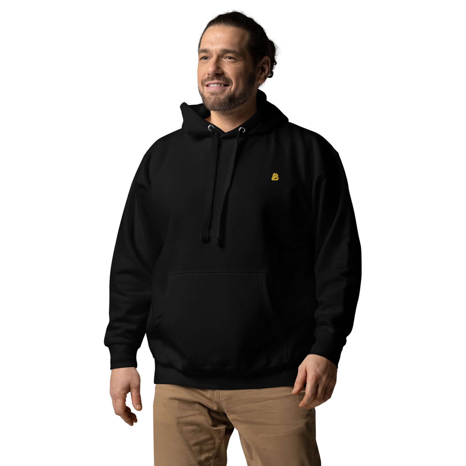 Man wearing Unisex-Kapuzenpullover N°50, a stylish black hoodie with front pocket and embroidered logo.