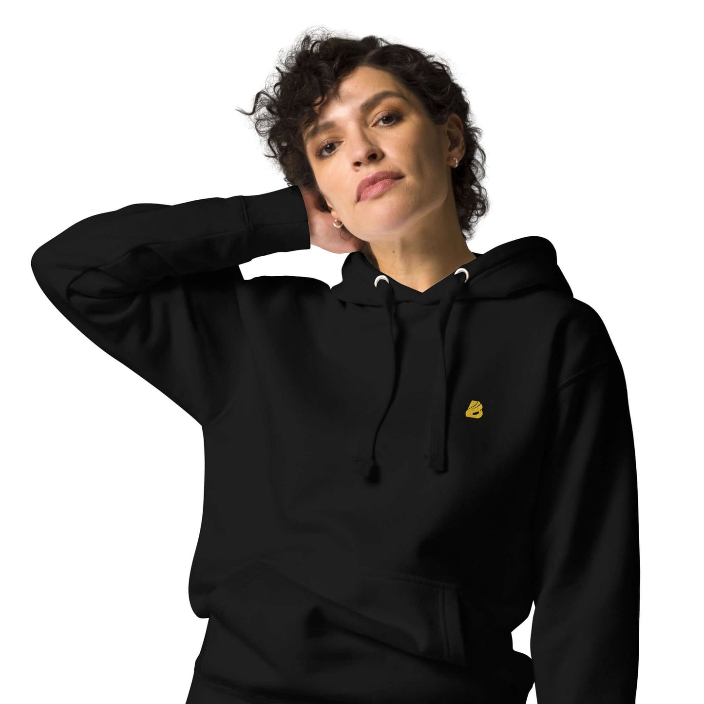Model wearing Unisex-Kapuzenpullover N°50, featuring a stylish design with front pocket and hood, made of cotton and polyester blend.