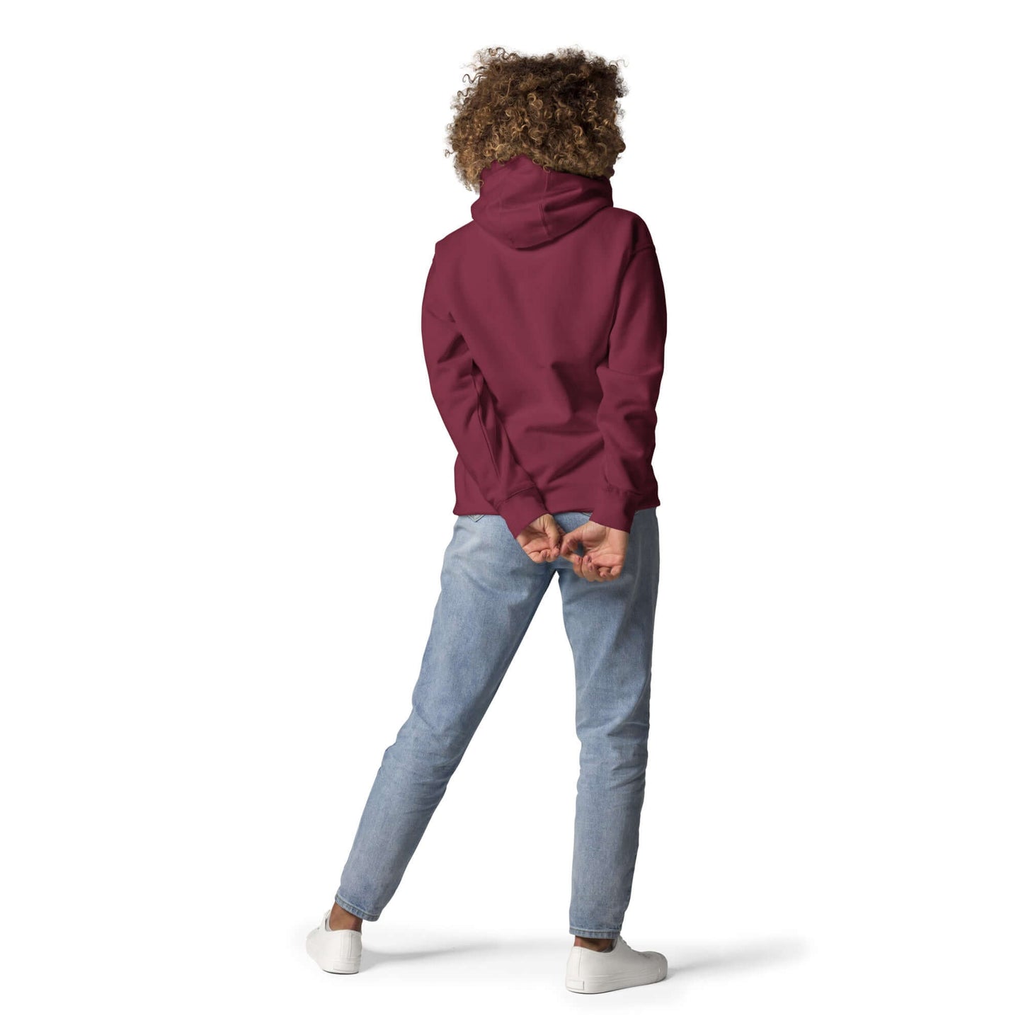 Back view of person wearing Unisex-Kapuzenpullover N°48 in maroon, paired with light blue jeans, showcasing streetwear style.