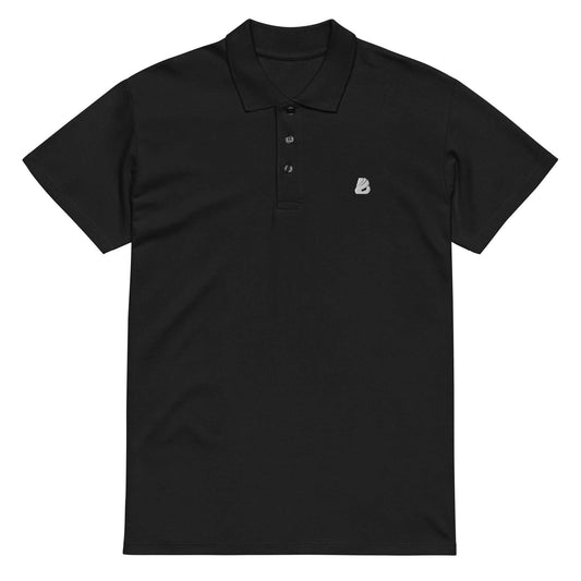 Premium-Piqué-Poloshirt N°0 in black with a matching button placket, made from soft, thick fabric for elegant and comfortable wear.