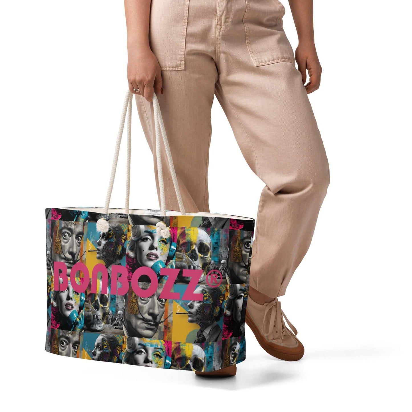 Person carrying Oversized Strandtasche with colorful design and rope handles, perfect for weekend essentials.