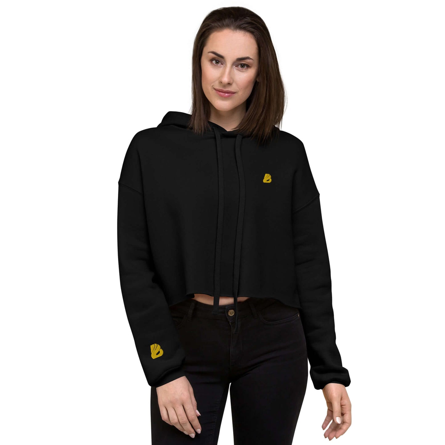 Woman wearing black Crop-Hoodie N°1 with trendy open hem and matching drawstrings for a stylish look