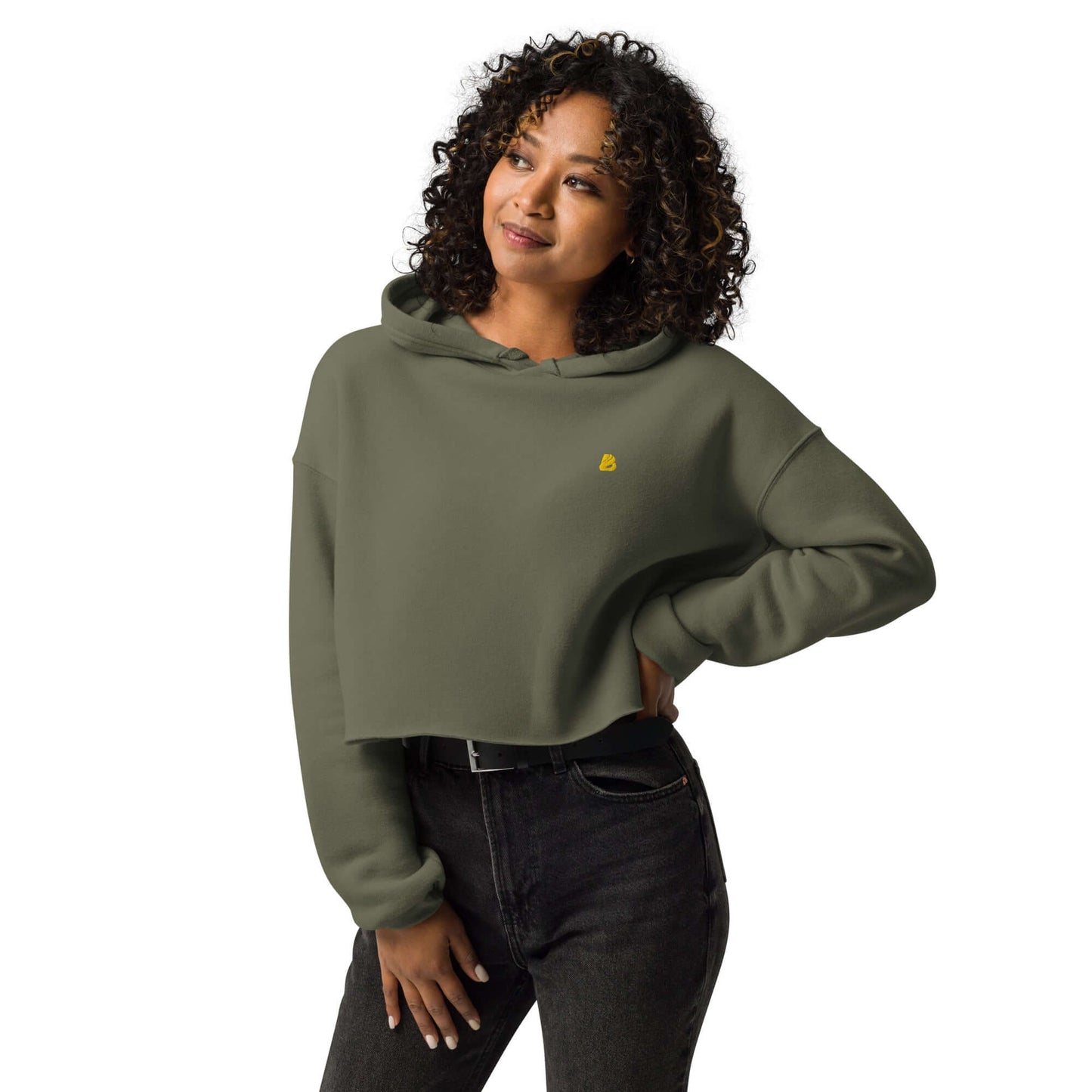 Woman wearing green Crop-Hoodie N°2 with open hem and matching drawstrings, a stylish addition to any wardrobe.