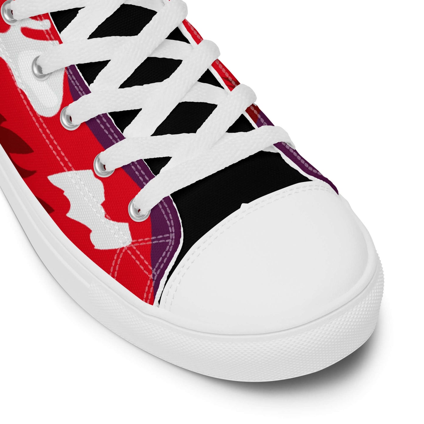 Detailansicht eines bunten High-Top Leinenschuhs für Damen mit weißen Schnürsenkeln und Gummisohle.