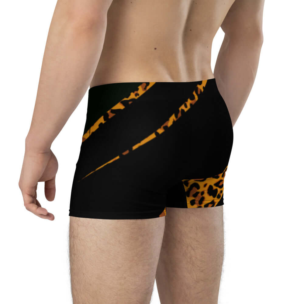 Back view of person wearing black and leopard print Boxer-Briefs N°4 with stretchy material for comfort and no back seam.