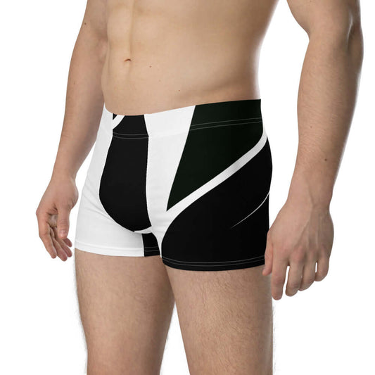 Side view of a man wearing Boxer-Briefs N°0 made from soft stretch material with a mid-waist fit and supportive lined pouch.