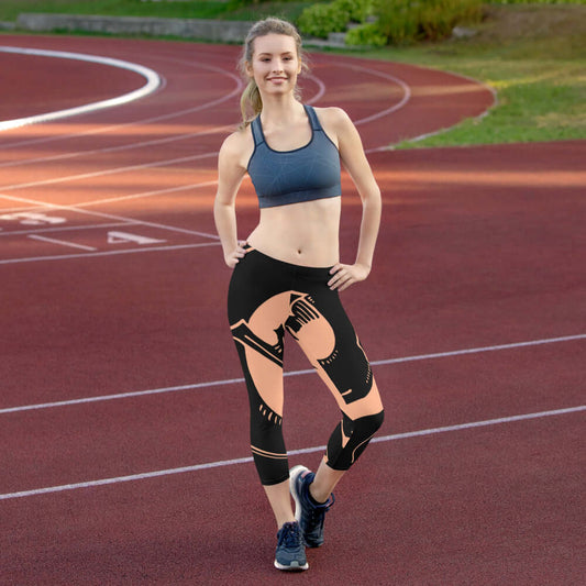 Woman wearing Capri-Leggings N°3 with athletic design on a track field, showcasing comfortable, stretchy fabric with UV protection.