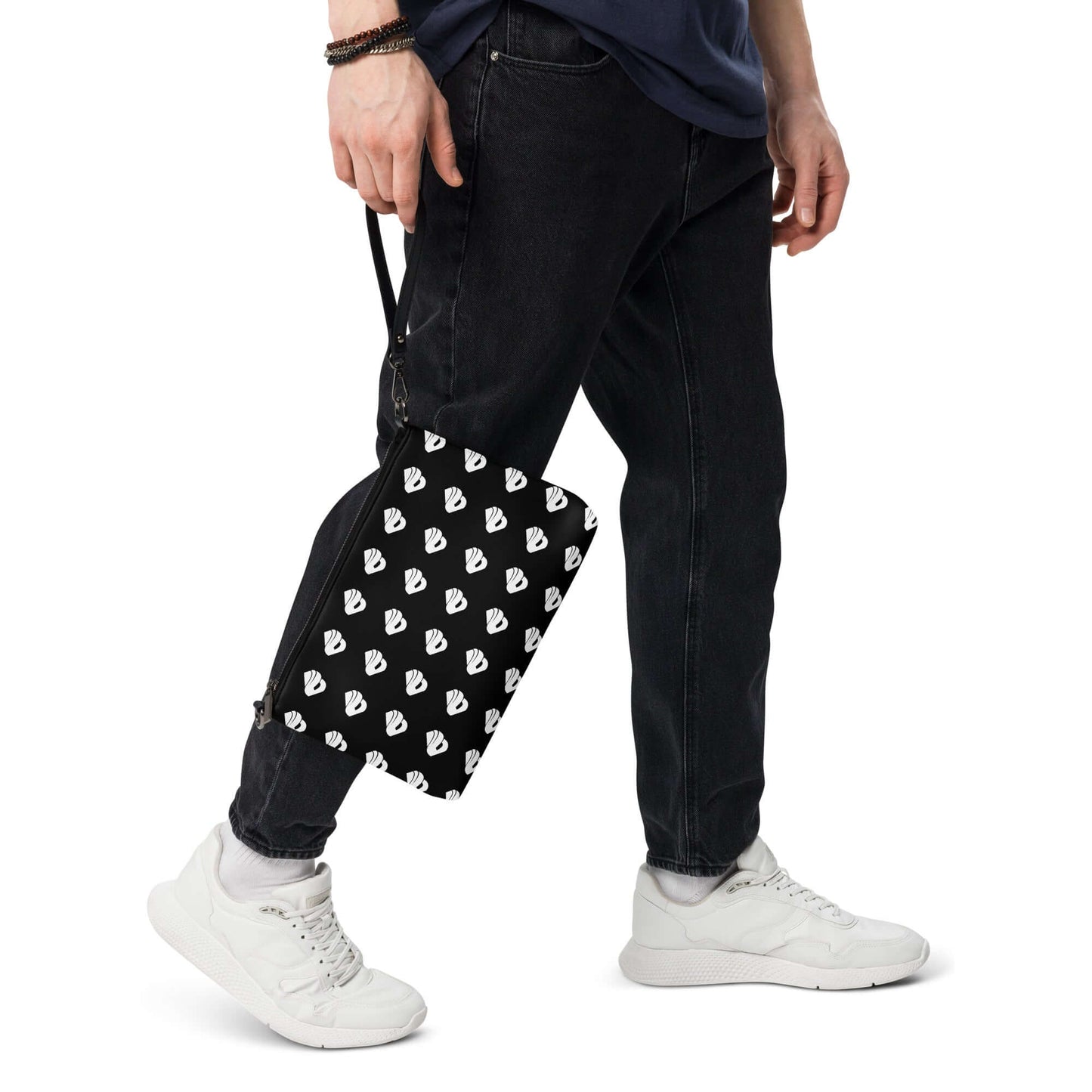 Person with Umhängetasche N°0 in black with white pattern, showing versatility and style, worn casually with detachable strap.