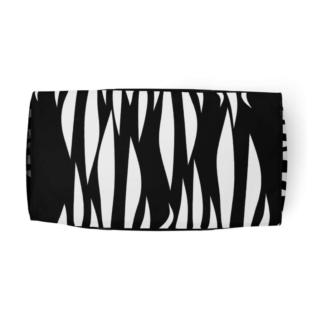 Alt Tag: Weekender N°3 with black and white abstract design, ideal for travel and daily use, featuring spacious compartments and adjustable straps.