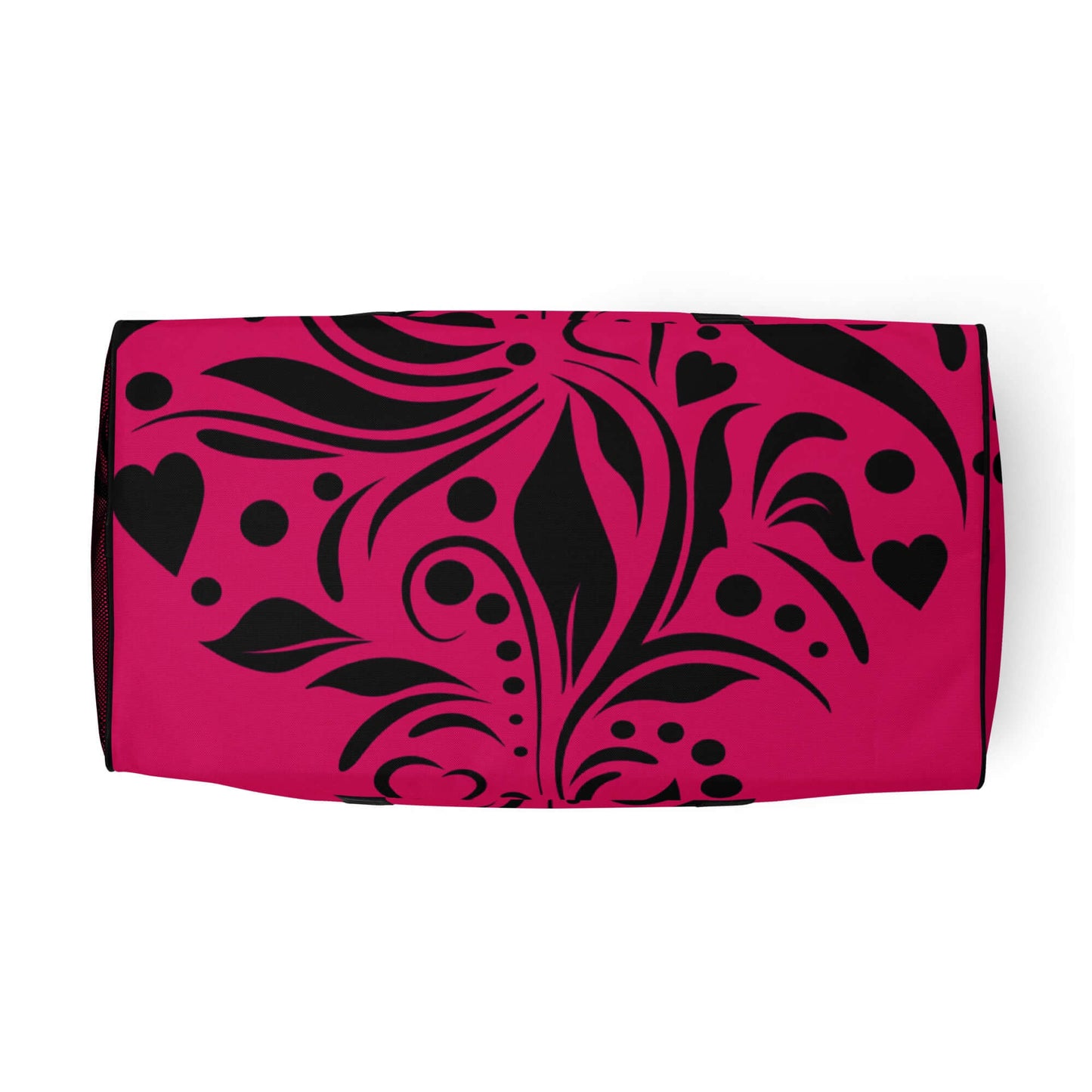 Top view of Weekender N°15 with black floral pattern on pink background