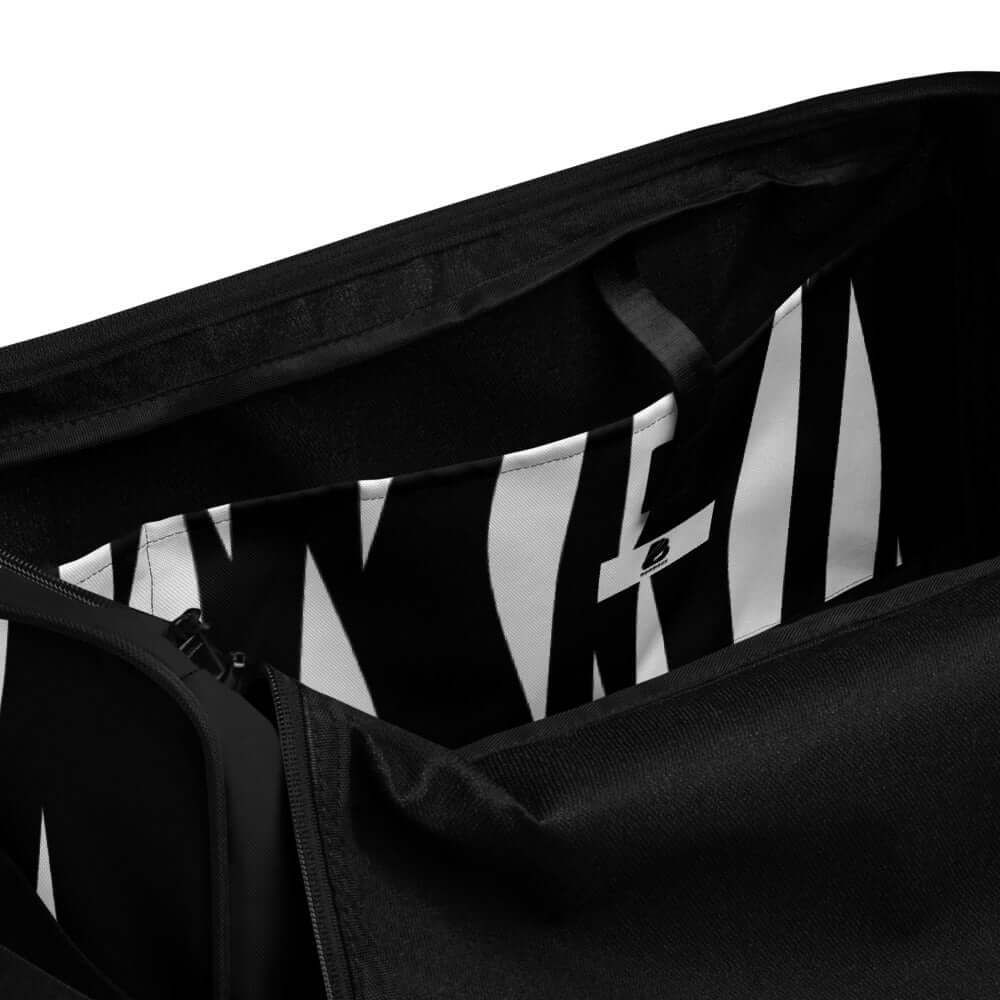 Interior view of the Weekender N°3 bag showcasing spacious compartments and zippered pockets for organized storage.