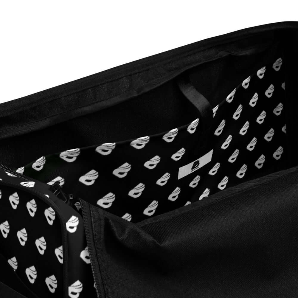 Interior of Weekender N°13 bag with patterned lining and multiple pockets for easy organization.