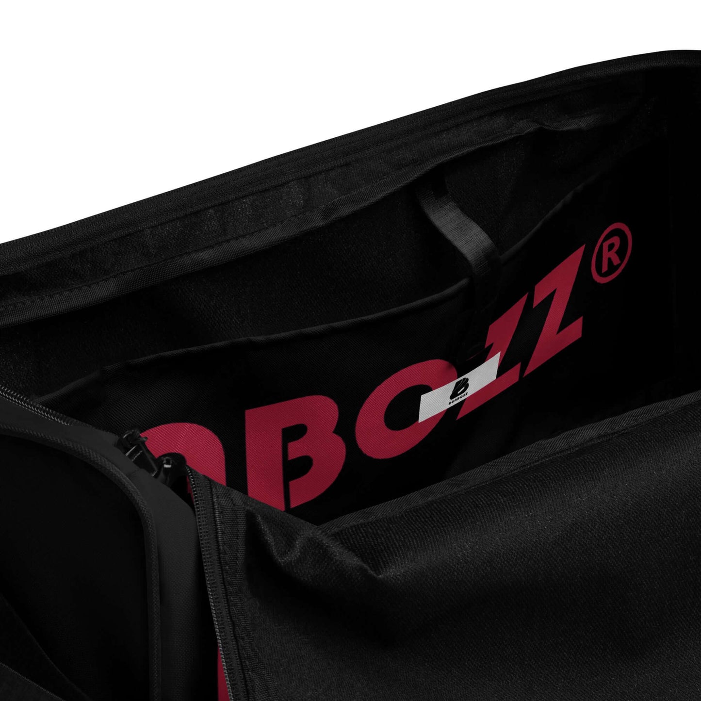 Interior view of black Weekender N°22 bag with spacious compartments and zipper pocket for valuables