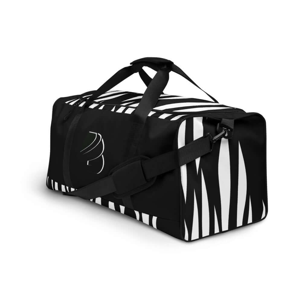 Weekender N°3 black and white striped travel bag with adjustable padded shoulder straps and multiple pockets for organized storage.
