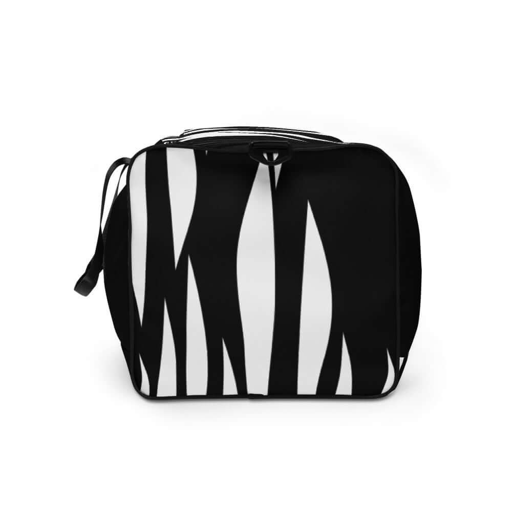 Weekender N°3 - Stylish black and white travel bag with adjustable padded straps and multiple compartments for convenience and organization.