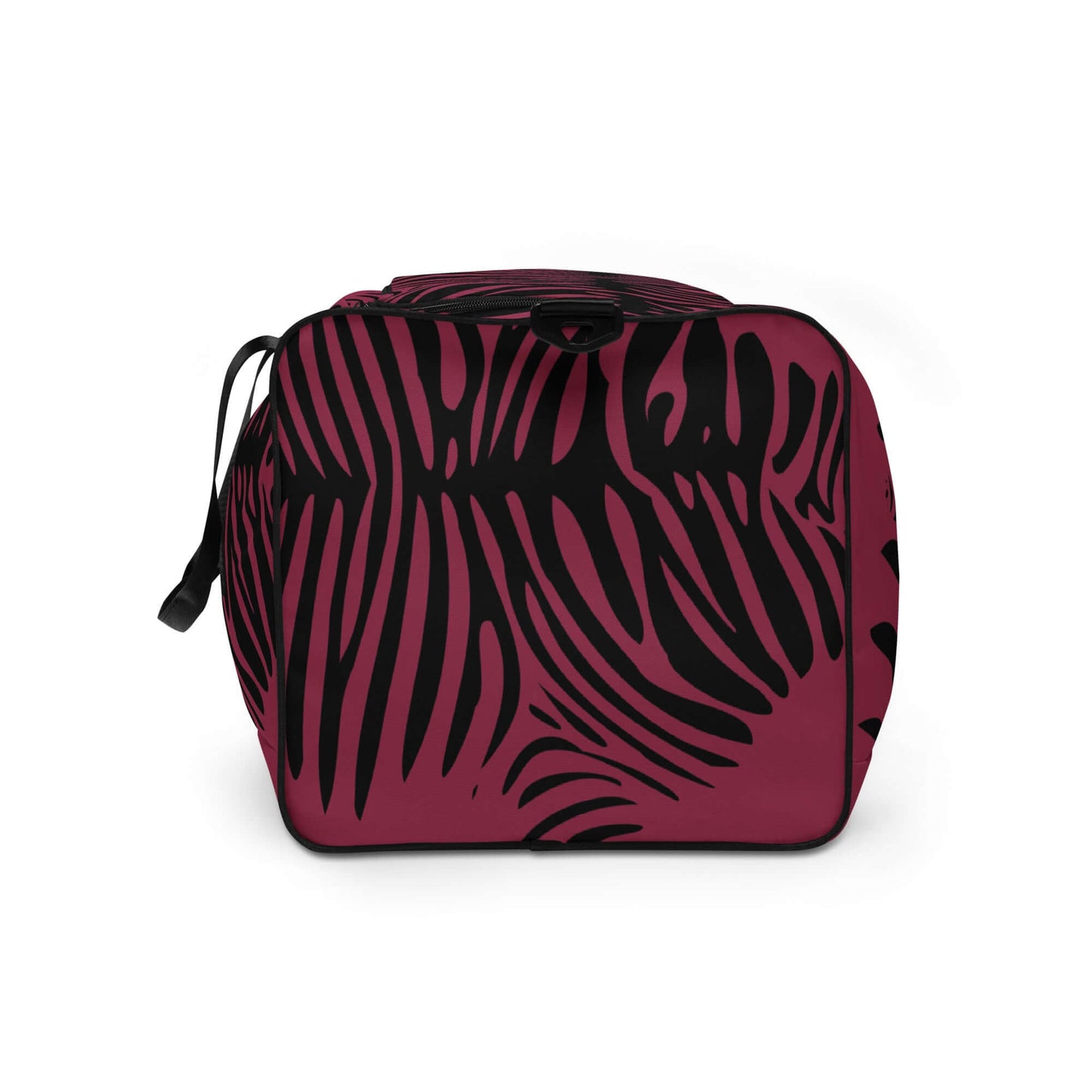 Weekender N°23 with stylish black leaf pattern on a burgundy background, ideal for travel and daily errands, with adjustable shoulder straps.