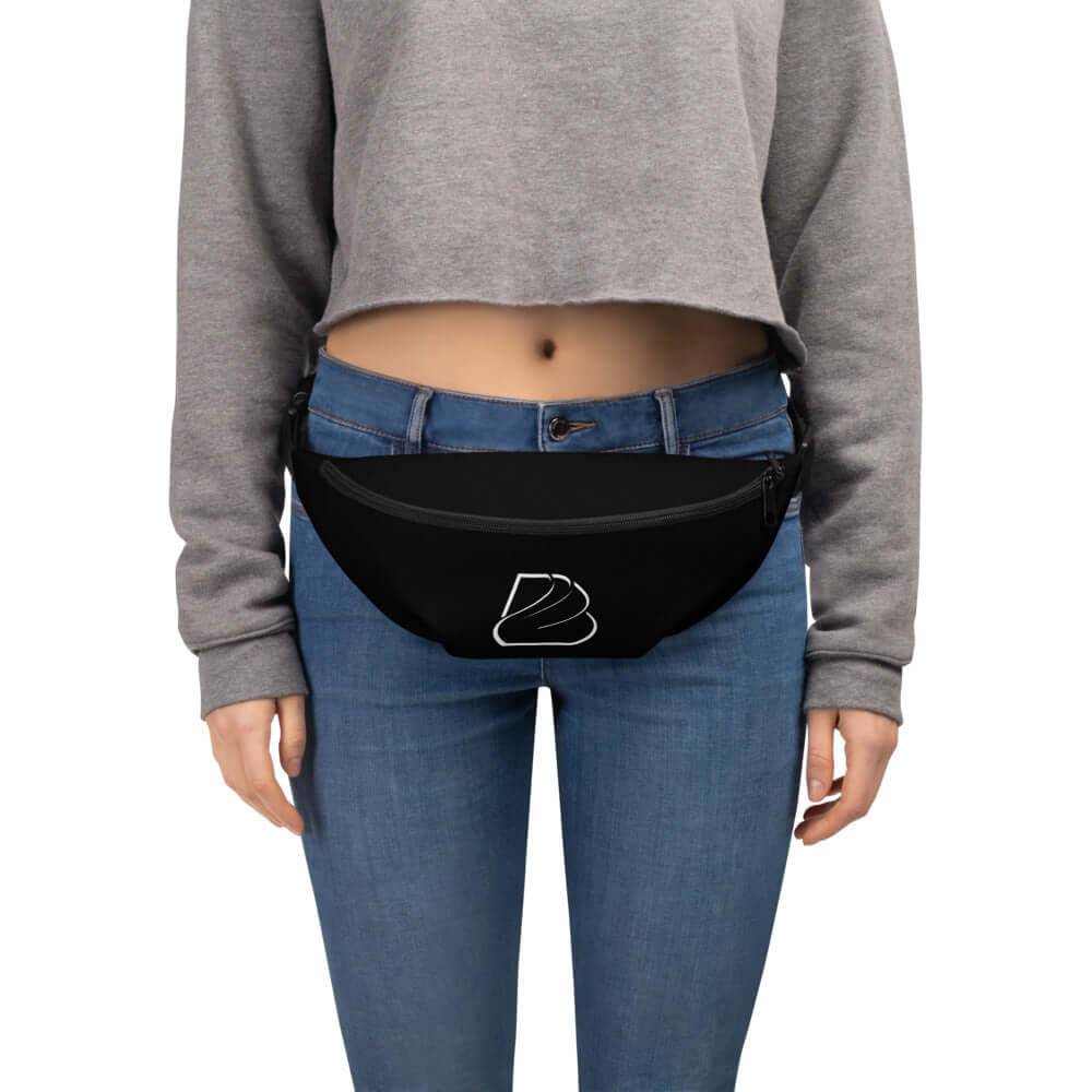 Person wearing Gürteltasche N°24, black adjustable waist bag with internal pocket, ideal for festival or travel use.
