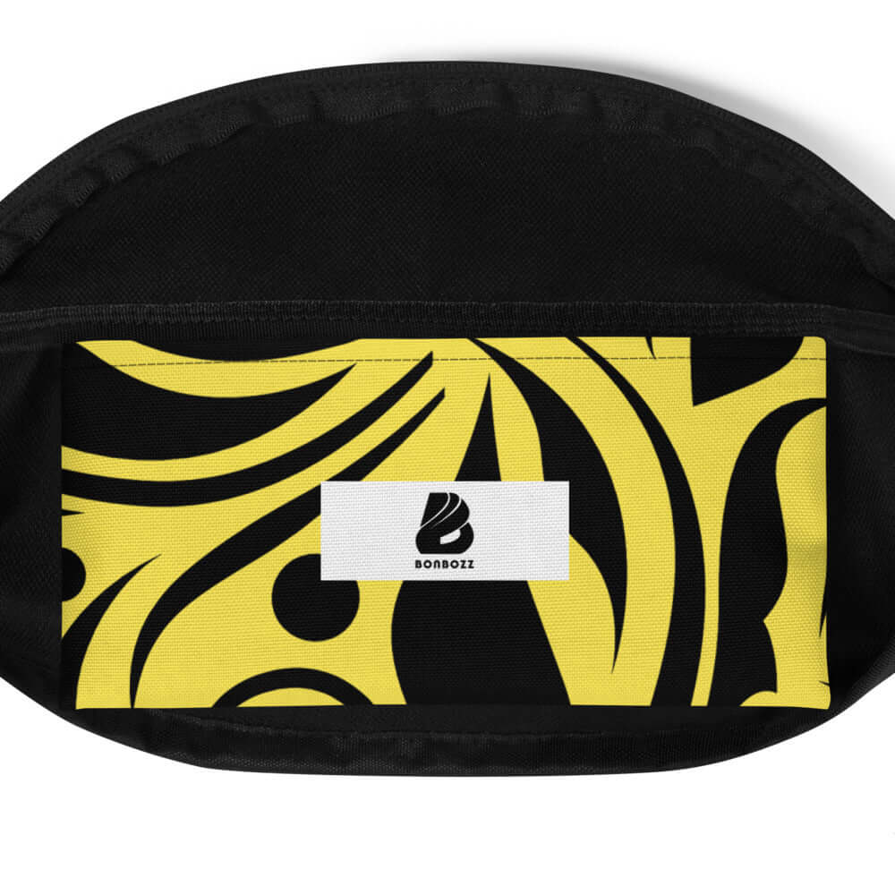 Black and yellow Gürteltasche N°12 with abstract design and adjustable strap, ideal for travel and festivals.