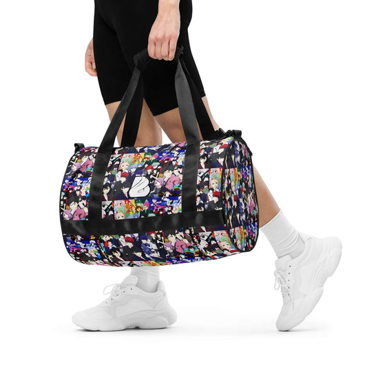 Person carrying Allover-Print-Sporttasche N°3, a colorful polyester sports bag with reinforced bottom, perfect for fitness and fun.