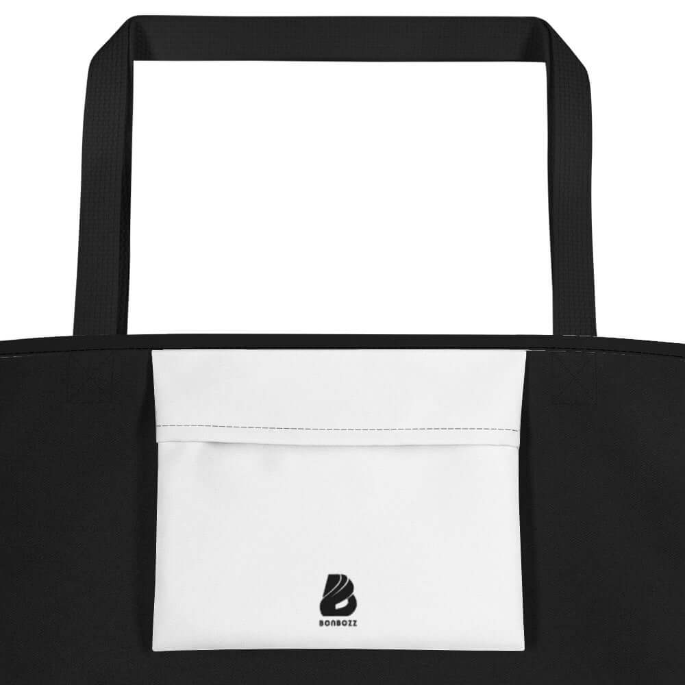 Strandtasche N°0 black and white with cotton handles, featuring a large inner pocket, durable colors, perfect for beach trips.