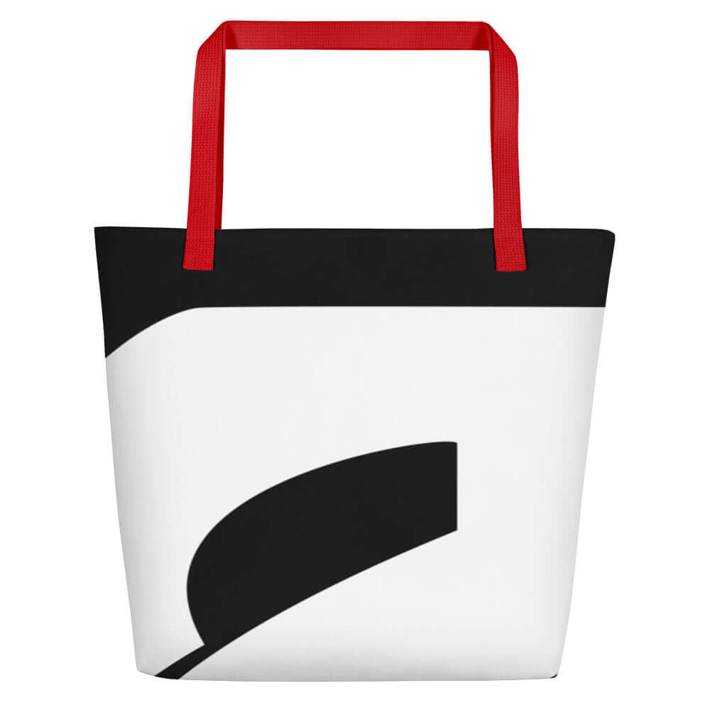 Strandtasche N°0 with bold black and white design, red handles, ideal for beach outings; durable, 100% polyester, large inner pocket.