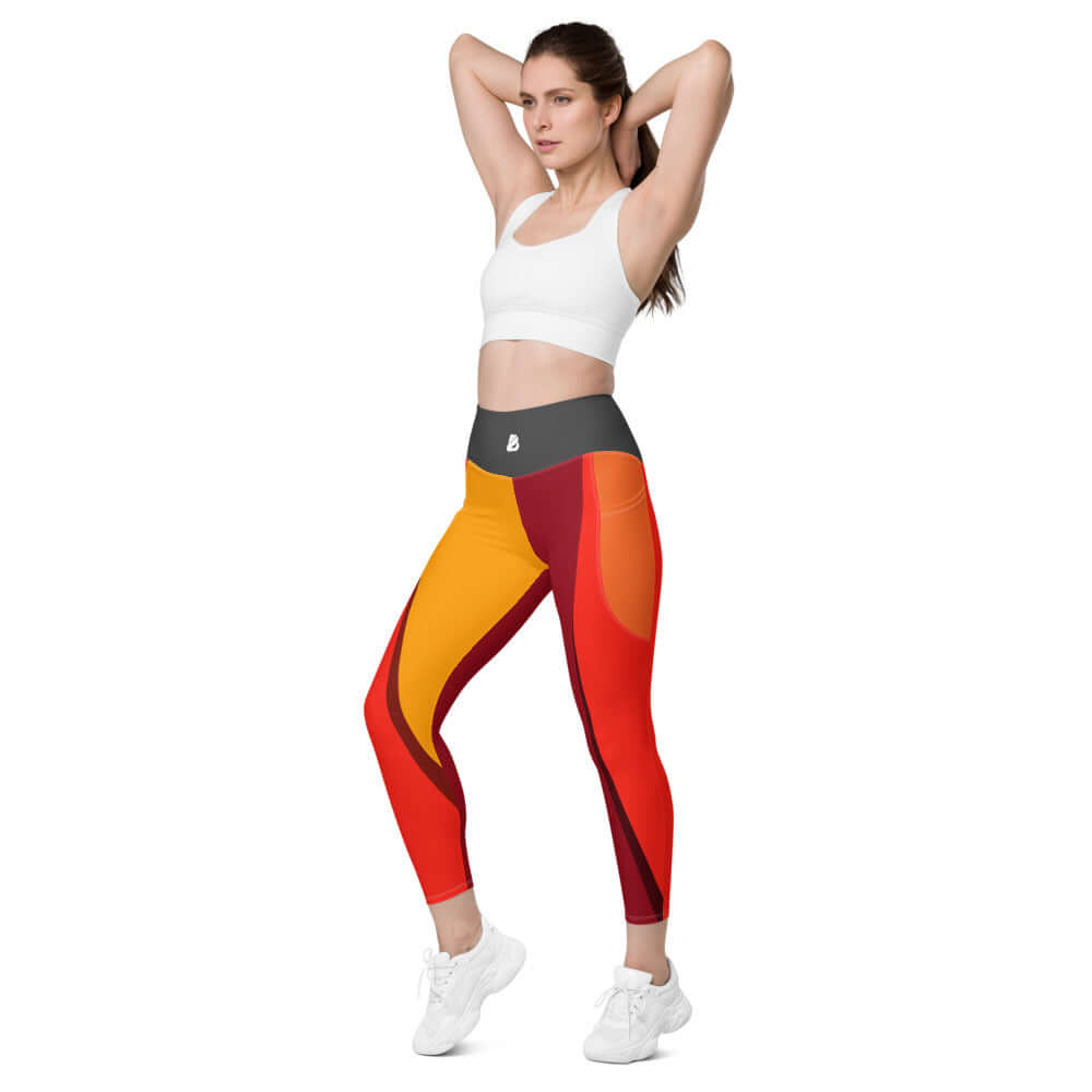 Woman modeling colorful high-waisted Leggings mit Taschen N°0, featuring side pockets and four-way stretch for comfort and versatility.