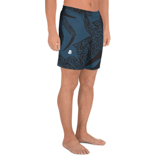 Man wearing Lange Allover-Sport-Shorts für Herren N°3 in blue with black patterns