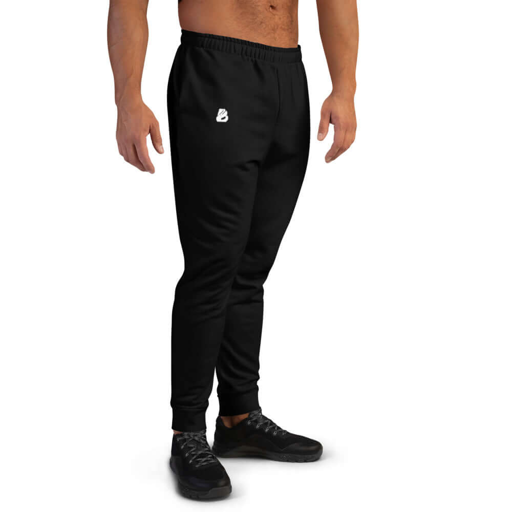 Herren-Jogginghose N°4 aus Baumwollmischung, ideal zum Joggen oder Entspannen, schwarz, weiche Fleece-Innenseite, enganliegend.