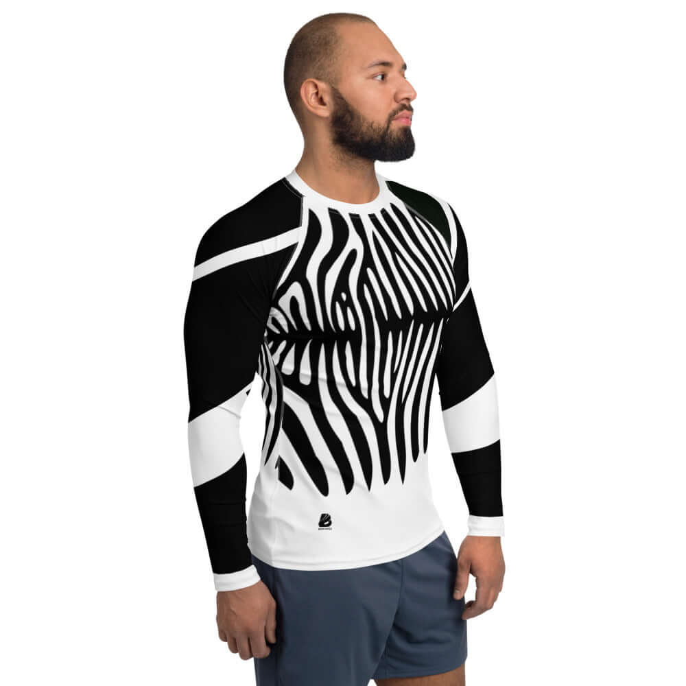 Man wearing Herren-Rash-Guard N°2 with zebra pattern design, long sleeves, and ergonomic fit, ideal for sun protection during sports activities.