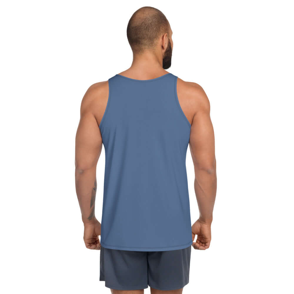 Back view of model wearing Unisex Tank-Top N°1 in blue, showcasing vibrant color and relaxed fit.
