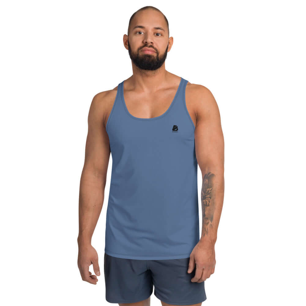 Unisex Tank-Top N°1 in blue worn by a male model, showcasing soft, stretchy fabric and relaxed fit for a stylish look.