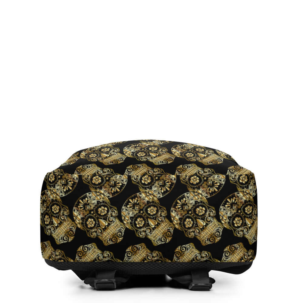 Front view of a bag with ornate gold patterned design on black fabric
