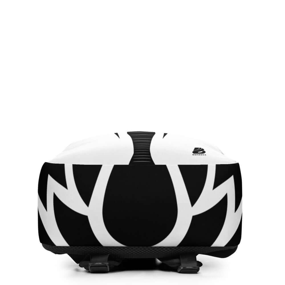 Minimalistischer Rucksack N°12 with abstract black and white pattern, offering spacious interior, laptop pocket, and hidden back compartment.