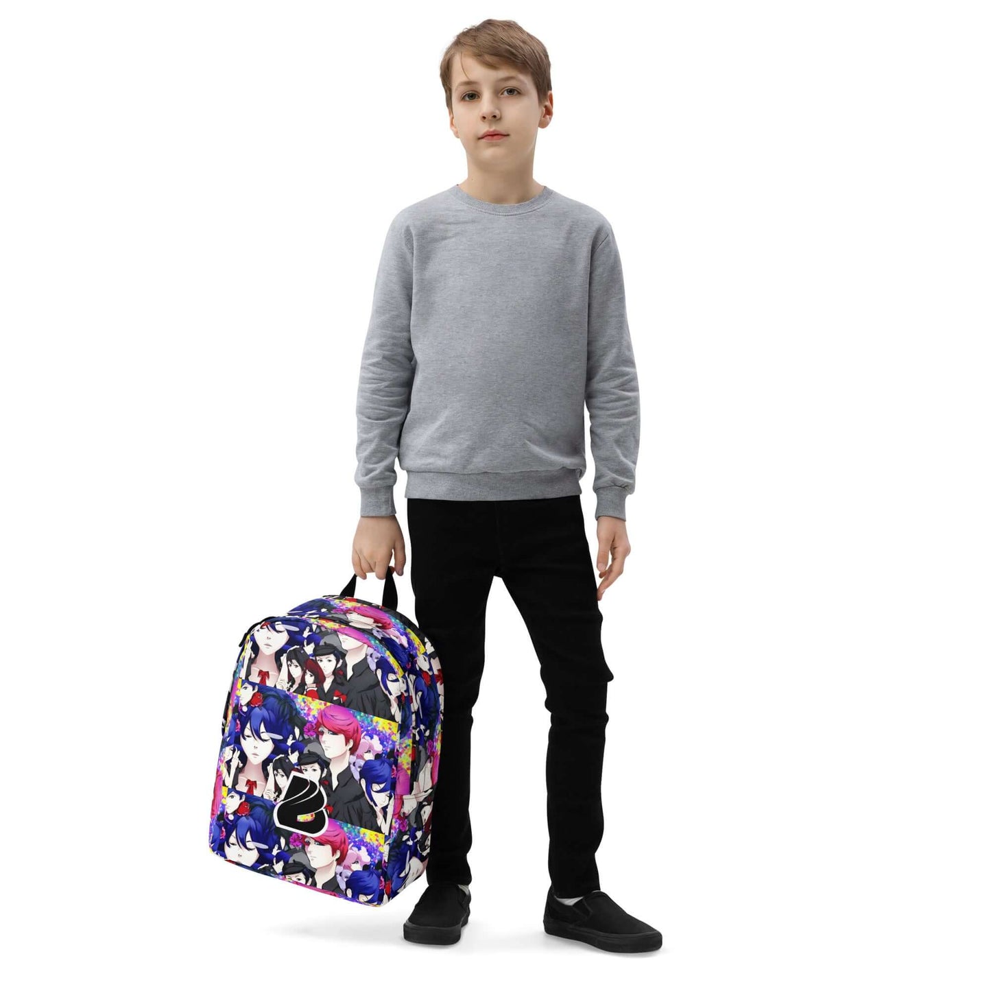 Child holding a colorful anime-themed backpack, standing against a white background.