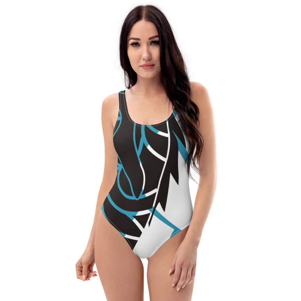 Einteiliger Badeanzug N°8 im modernen Design, für alle Figuren schmeichelnd. Chlorbeständiger Stoff mit U-Ausschnitt vorne und hinten.