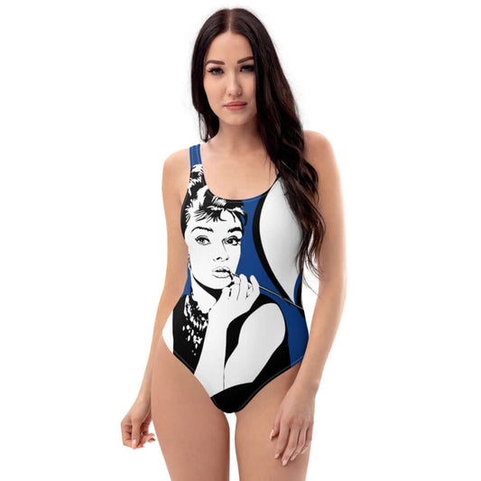 Model wearing Einteiliger Badeanzug N°9 with graphic design, showcasing flattering fit and smooth fabric.
