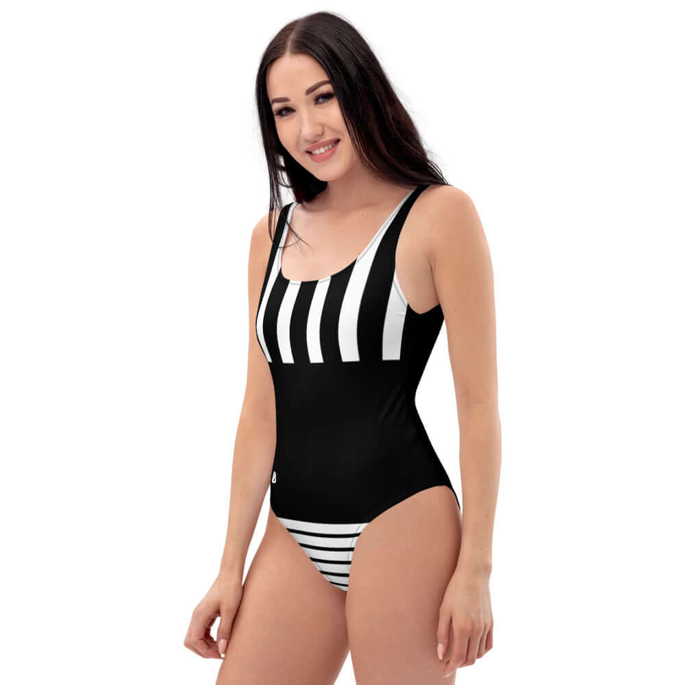 Model wearing Einteiliger Badeanzug N°1 with stripes, flattering fit for all figures, perfect for beach or pool, chlorbeständig.