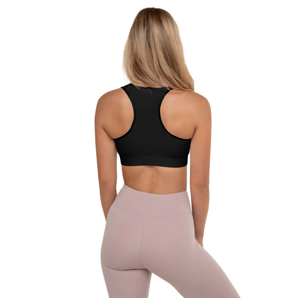 Rückansicht einer Frau im Gepolsterter Sport-BH N°1, ideal für Workouts mit feuchtigkeitsabsorbierendem Stoff und maximalem Halt.