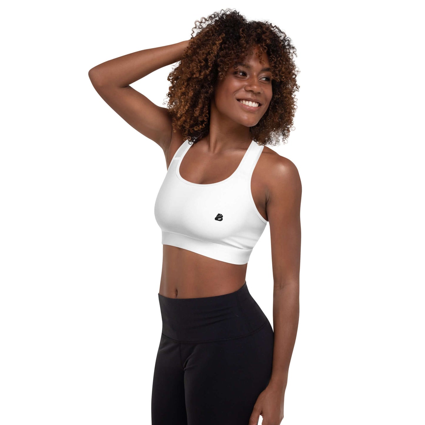 Model wearing Gepolsterter Sport-BH N°4 in white for workouts, featuring soft, moisture-wicking fabric and removable pads for maximum support.