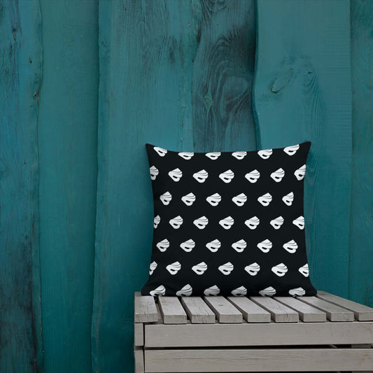 Premium-Kissen N°0 with stylish pattern on wooden bench against teal background.